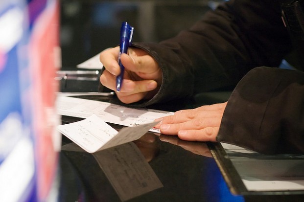 customer depositing check David Goehring / Flickr | https://www.flickr.com/photos/carbonnyc/2204277278/