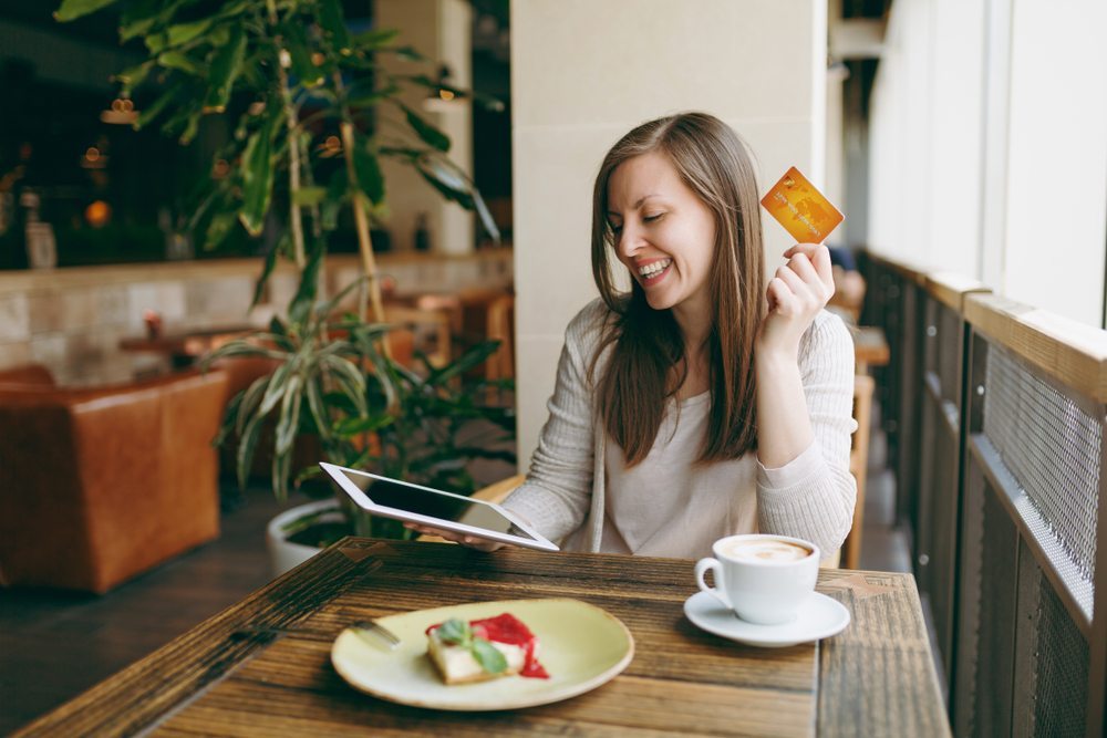 Woman holding a credit card