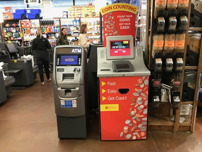 which supermarket has a coin machine uk