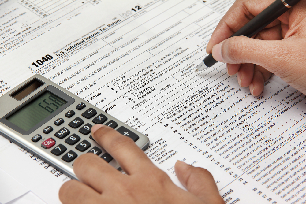 Paying Your Taxes With a Credit Card vs. Personal Bank Loan: Which Is Cheaper?
