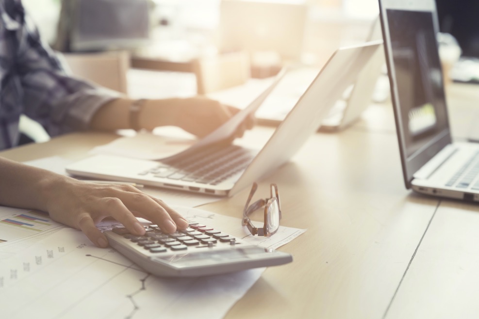 Image Credit | https://www.shutterstock.com/pic-417130852/stock-photo-woman-working-with-calculator-business-document-and-laptop-computer-notebook-vintage-tone.html?src=2dos7926_outAOT-06wu5A-1-19